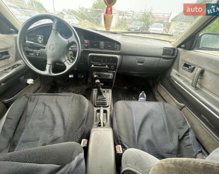Сірий Мазда 626, об'ємом двигуна 1.8 л та пробігом 245 тис. км за 900 $, фото 12 на Automoto.ua