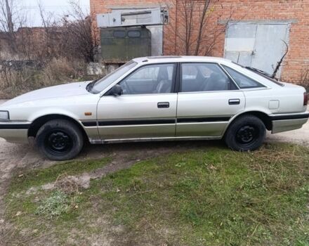 Серый Мазда 626, объемом двигателя 2 л и пробегом 280 тыс. км за 1300 $, фото 1 на Automoto.ua