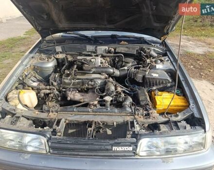 Серый Мазда 626, объемом двигателя 2 л и пробегом 430 тыс. км за 1200 $, фото 6 на Automoto.ua