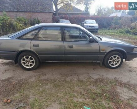 Серый Мазда 626, объемом двигателя 2 л и пробегом 430 тыс. км за 1200 $, фото 3 на Automoto.ua