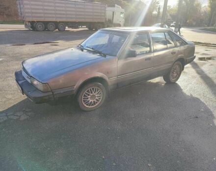 Серый Мазда 626, объемом двигателя 2 л и пробегом 200 тыс. км за 750 $, фото 5 на Automoto.ua