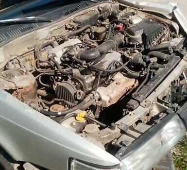 Серый Мазда 626, объемом двигателя 2 л и пробегом 300 тыс. км за 1200 $, фото 2 на Automoto.ua