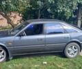 Серый Мазда 626, объемом двигателя 2 л и пробегом 300 тыс. км за 1900 $, фото 1 на Automoto.ua