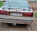 Серый Мазда 626, объемом двигателя 2 л и пробегом 350 тыс. км за 600 $, фото 1 на Automoto.ua