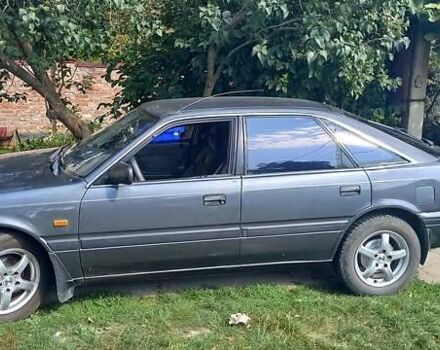 Серый Мазда 626, объемом двигателя 2 л и пробегом 300 тыс. км за 1900 $, фото 1 на Automoto.ua