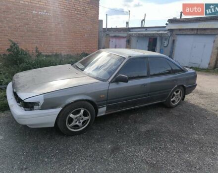 Серый Мазда 626, объемом двигателя 2 л и пробегом 400 тыс. км за 1500 $, фото 1 на Automoto.ua