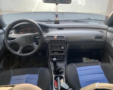 Серый Мазда 626, объемом двигателя 1.8 л и пробегом 400 тыс. км за 899 $, фото 4 на Automoto.ua