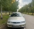Серый Мазда 626, объемом двигателя 2 л и пробегом 438 тыс. км за 2501 $, фото 1 на Automoto.ua
