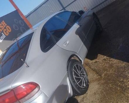 Серый Мазда 626, объемом двигателя 2 л и пробегом 121 тыс. км за 1999 $, фото 1 на Automoto.ua