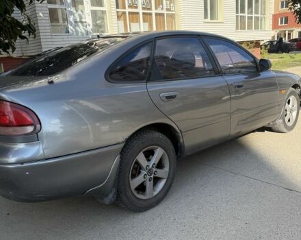 Сірий Мазда 626, об'ємом двигуна 2 л та пробігом 349 тис. км за 1900 $, фото 7 на Automoto.ua