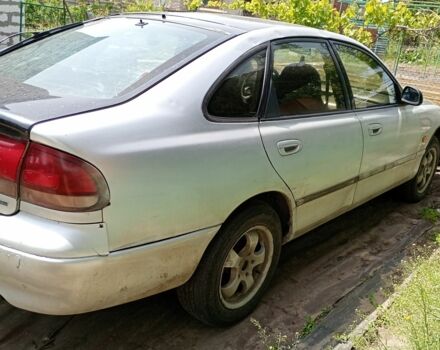 Серый Мазда 626, объемом двигателя 1.8 л и пробегом 650 тыс. км за 1050 $, фото 1 на Automoto.ua