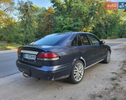 Серый Мазда 626, объемом двигателя 1.84 л и пробегом 350 тыс. км за 2100 $, фото 3 на Automoto.ua