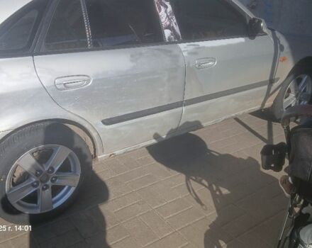 Серый Мазда 626, объемом двигателя 2 л и пробегом 1 тыс. км за 2700 $, фото 1 на Automoto.ua