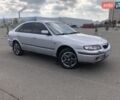 Серый Мазда 626, объемом двигателя 1.8 л и пробегом 250 тыс. км за 2999 $, фото 1 на Automoto.ua