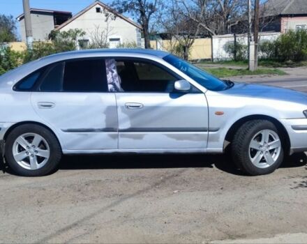 Серый Мазда 626, объемом двигателя 2 л и пробегом 1 тыс. км за 2700 $, фото 4 на Automoto.ua