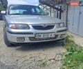 Серый Мазда 626, объемом двигателя 1.8 л и пробегом 286 тыс. км за 2199 $, фото 1 на Automoto.ua