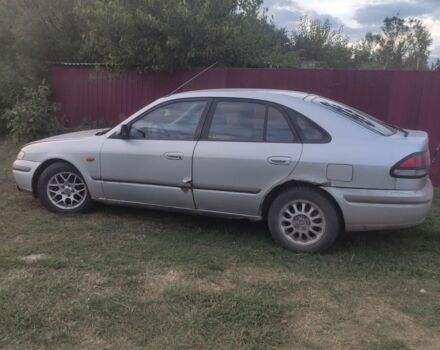 Серый Мазда 626, объемом двигателя 2 л и пробегом 250 тыс. км за 800 $, фото 3 на Automoto.ua