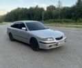 Серый Мазда 626, объемом двигателя 2 л и пробегом 305 тыс. км за 1999 $, фото 1 на Automoto.ua