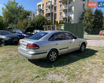 Серый Мазда 626, объемом двигателя 2 л и пробегом 383 тыс. км за 1650 $, фото 2 на Automoto.ua