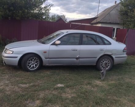 Серый Мазда 626, объемом двигателя 2 л и пробегом 250 тыс. км за 800 $, фото 2 на Automoto.ua