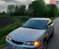 Серый Мазда 626, объемом двигателя 2 л и пробегом 380 тыс. км за 1800 $, фото 1 на Automoto.ua