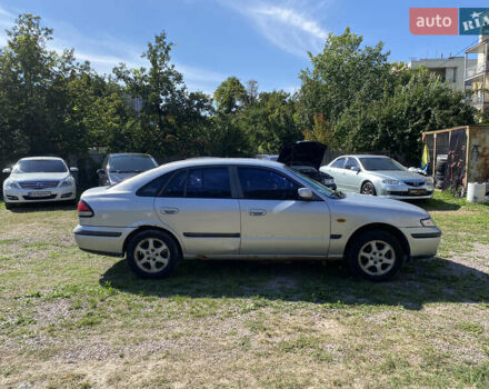 Серый Мазда 626, объемом двигателя 2 л и пробегом 383 тыс. км за 1650 $, фото 1 на Automoto.ua