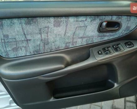 Серый Мазда 626, объемом двигателя 2 л и пробегом 256 тыс. км за 3550 $, фото 4 на Automoto.ua