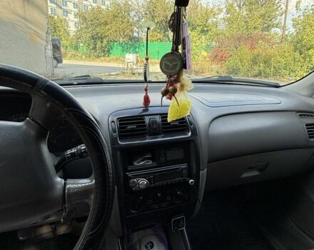 Серый Мазда 626, объемом двигателя 1.8 л и пробегом 299 тыс. км за 2400 $, фото 2 на Automoto.ua