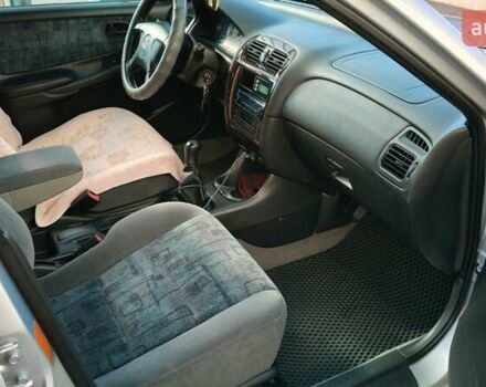 Серый Мазда 626, объемом двигателя 2 л и пробегом 256 тыс. км за 3550 $, фото 1 на Automoto.ua