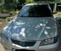 Сірий Мазда 626, об'ємом двигуна 1.84 л та пробігом 270 тис. км за 1899 $, фото 1 на Automoto.ua