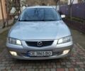 Серый Мазда 626, объемом двигателя 1.84 л и пробегом 215 тыс. км за 3500 $, фото 1 на Automoto.ua
