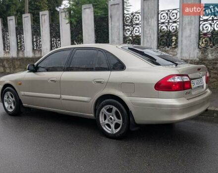 Серый Мазда 626, объемом двигателя 2 л и пробегом 223 тыс. км за 2650 $, фото 1 на Automoto.ua