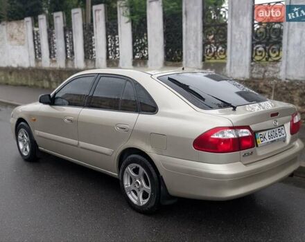 Серый Мазда 626, объемом двигателя 2 л и пробегом 223 тыс. км за 2650 $, фото 2 на Automoto.ua