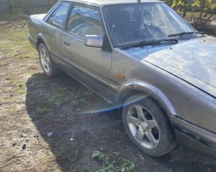 Серый Мазда 626, объемом двигателя 2 л и пробегом 330 тыс. км за 716 $, фото 1 на Automoto.ua