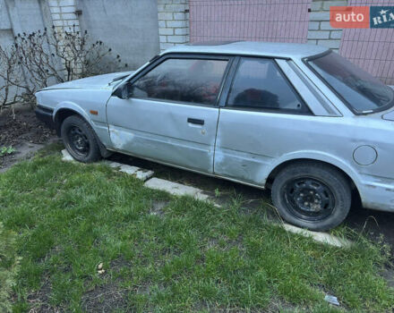 Серый Мазда 626, объемом двигателя 2 л и пробегом 200 тыс. км за 900 $, фото 2 на Automoto.ua