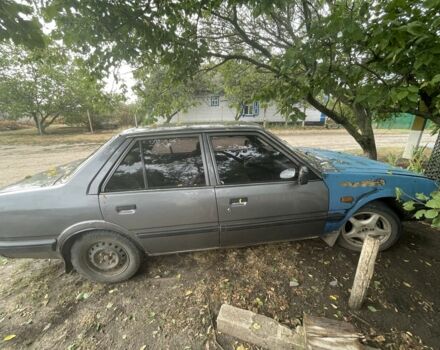 Серый Мазда 626, объемом двигателя 2 л и пробегом 7 тыс. км за 606 $, фото 4 на Automoto.ua