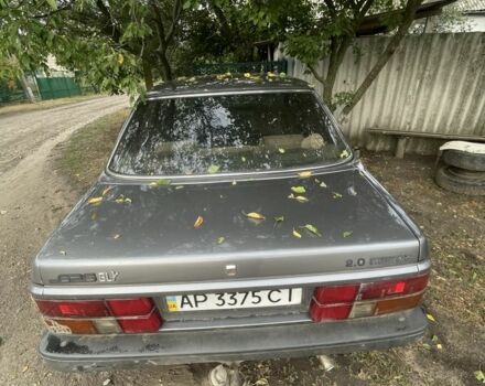 Серый Мазда 626, объемом двигателя 2 л и пробегом 7 тыс. км за 606 $, фото 3 на Automoto.ua