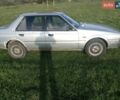 Серый Мазда 626, объемом двигателя 2 л и пробегом 410 тыс. км за 700 $, фото 1 на Automoto.ua