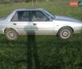 Серый Мазда 626, объемом двигателя 2 л и пробегом 410 тыс. км за 700 $, фото 1 на Automoto.ua