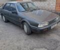 Серый Мазда 626, объемом двигателя 2 л и пробегом 496 тыс. км за 900 $, фото 1 на Automoto.ua