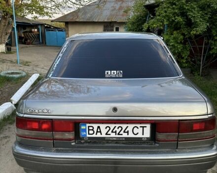 Серый Мазда 626, объемом двигателя 2 л и пробегом 406 тыс. км за 2099 $, фото 1 на Automoto.ua