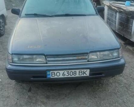 Серый Мазда 626, объемом двигателя 2 л и пробегом 490 тыс. км за 800 $, фото 6 на Automoto.ua