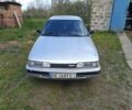 Серый Мазда 626, объемом двигателя 2 л и пробегом 300 тыс. км за 700 $, фото 1 на Automoto.ua