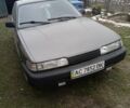 Серый Мазда 626, объемом двигателя 2 л и пробегом 350 тыс. км за 800 $, фото 1 на Automoto.ua