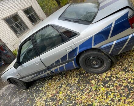 Серый Мазда 626, объемом двигателя 2 л и пробегом 200 тыс. км за 950 $, фото 3 на Automoto.ua