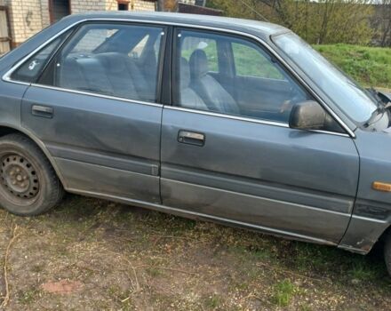 Серый Мазда 626, объемом двигателя 2 л и пробегом 300 тыс. км за 461 $, фото 1 на Automoto.ua