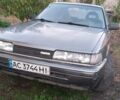 Серый Мазда 626, объемом двигателя 2 л и пробегом 384 тыс. км за 950 $, фото 1 на Automoto.ua