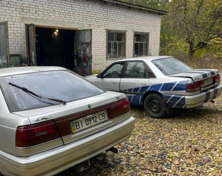 Серый Мазда 626, объемом двигателя 2 л и пробегом 200 тыс. км за 950 $, фото 2 на Automoto.ua