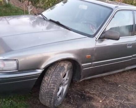 Серый Мазда 626, объемом двигателя 2 л и пробегом 384 тыс. км за 1000 $, фото 1 на Automoto.ua