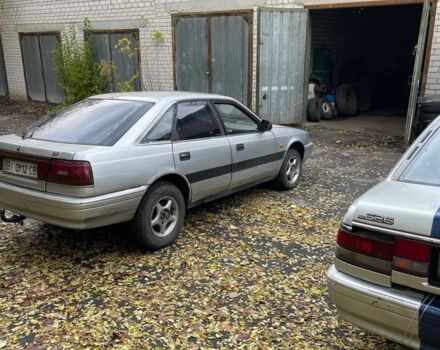 Серый Мазда 626, объемом двигателя 2 л и пробегом 200 тыс. км за 950 $, фото 11 на Automoto.ua